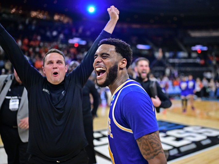 PROVIDENCE, RHODE ISLAND - MARCH 20: Will Wade head coach of the McNeese Cowboys and Brandon Murray #23 celebrate their win over the Clemson University Tigers during the first round of the 2025 NCAA Men’s Basketball Tournament held at Amica Mutual Pavillion on March 20, 2025 in Providence, Rhode Island.