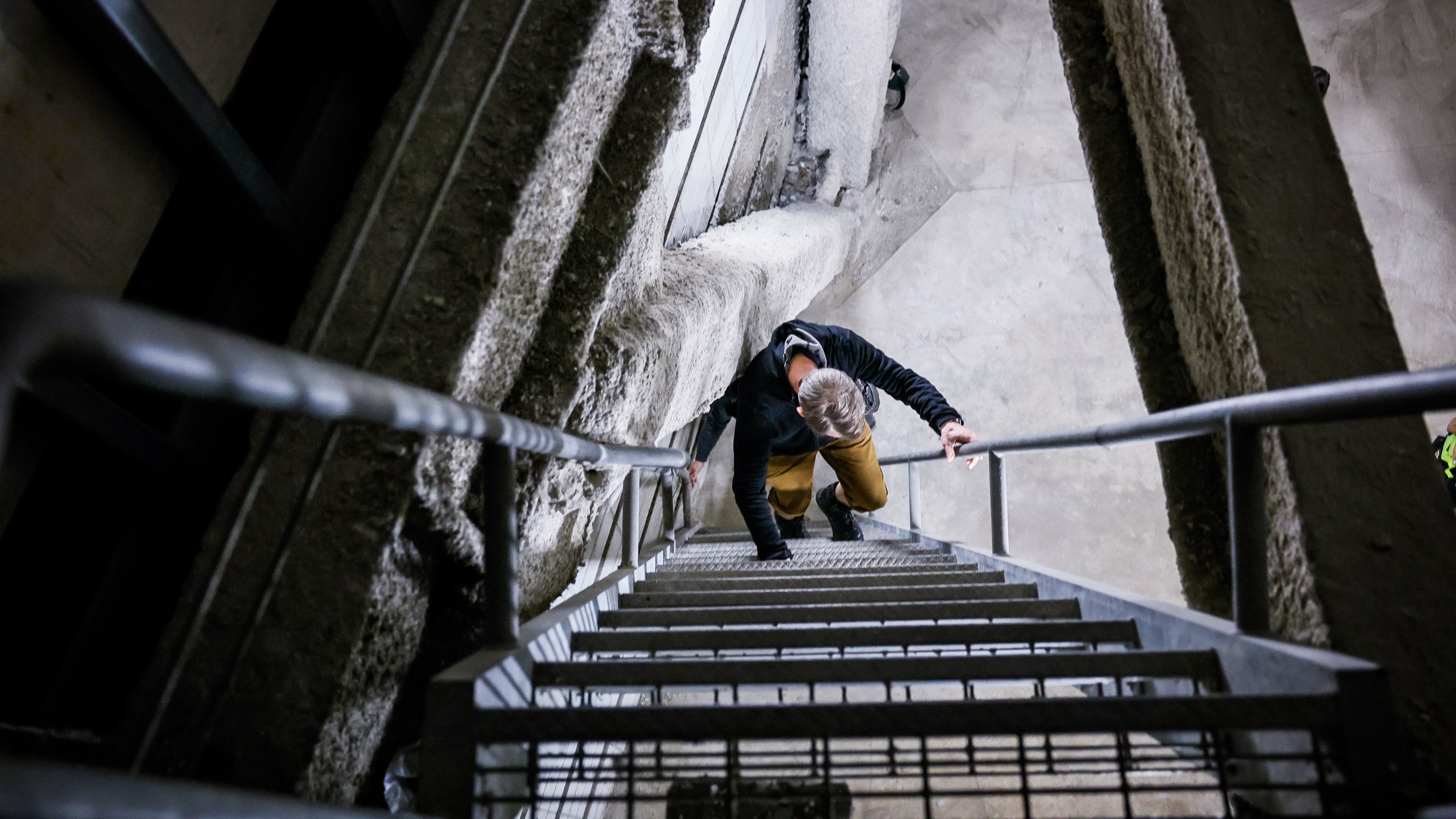 Michael Townsend descends the stairs from the space where the secret mall apartment used to be.