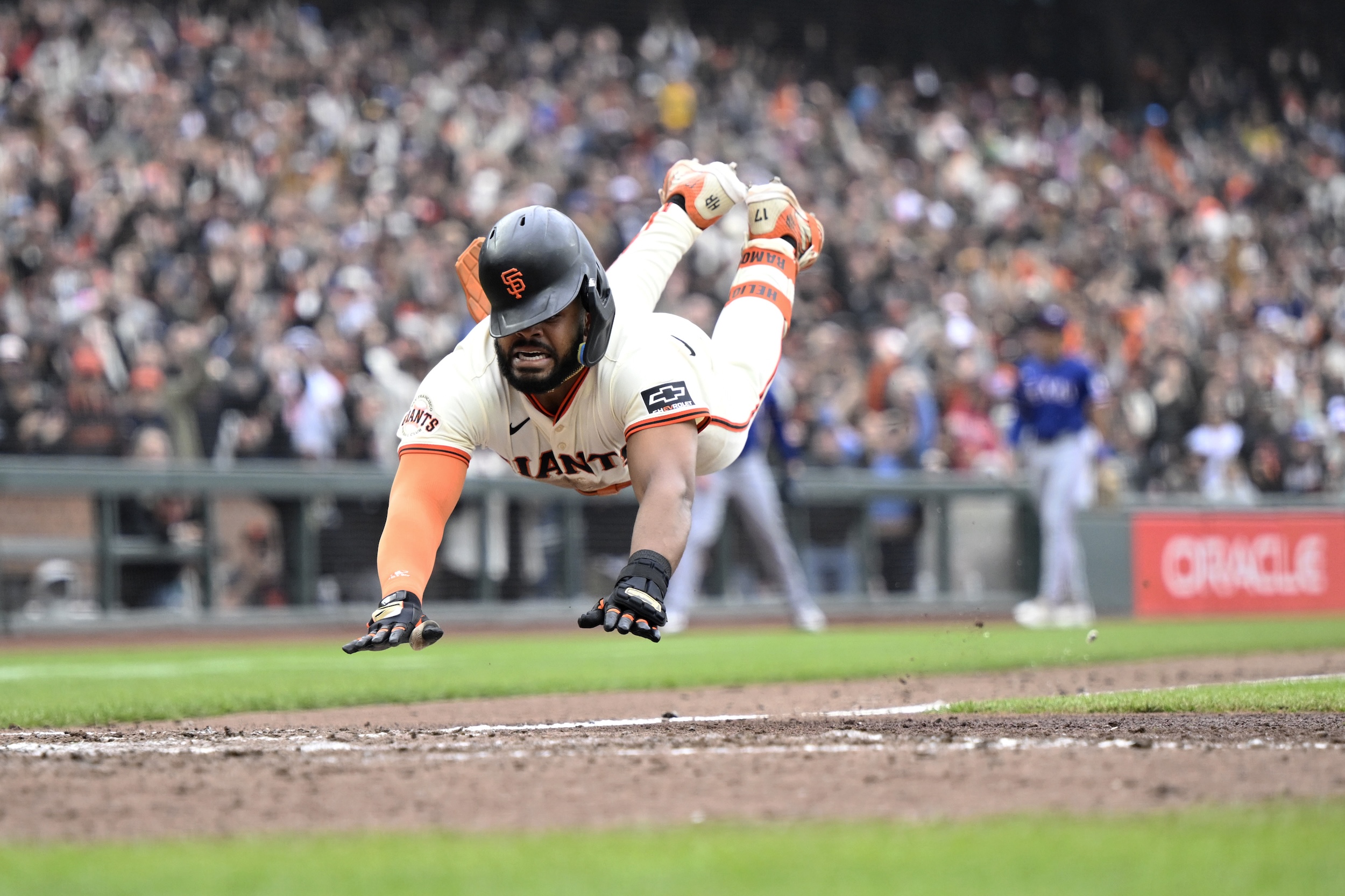 Heliot Ramos of the San Francisco Giants scores the game-winning run.